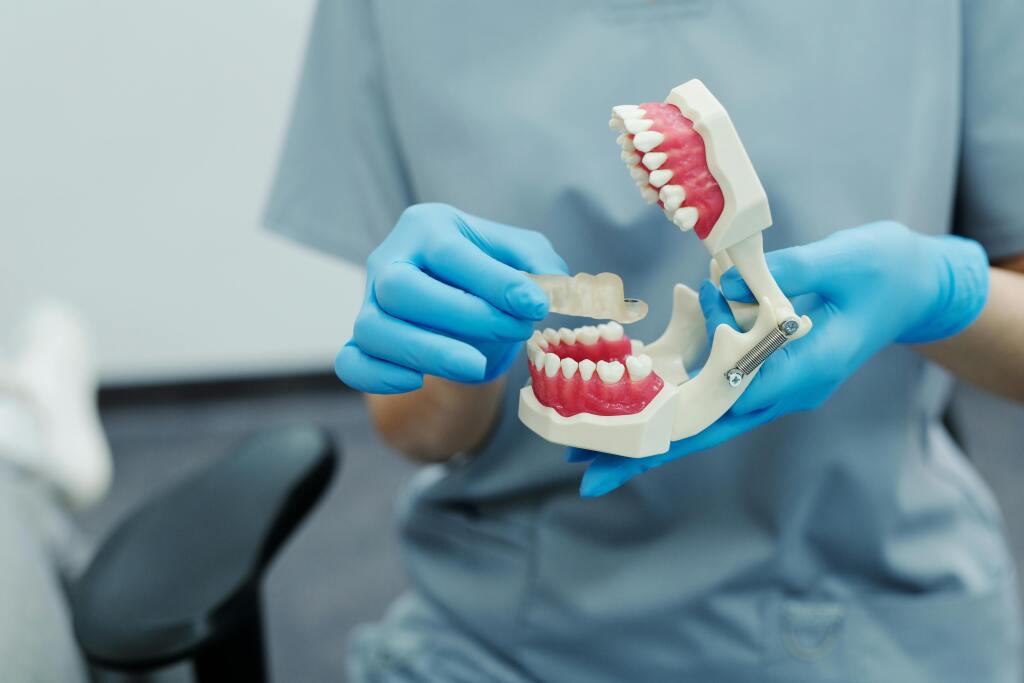 Night Guard for Teeth Grinding: TMJ Relief, Types, and Cost